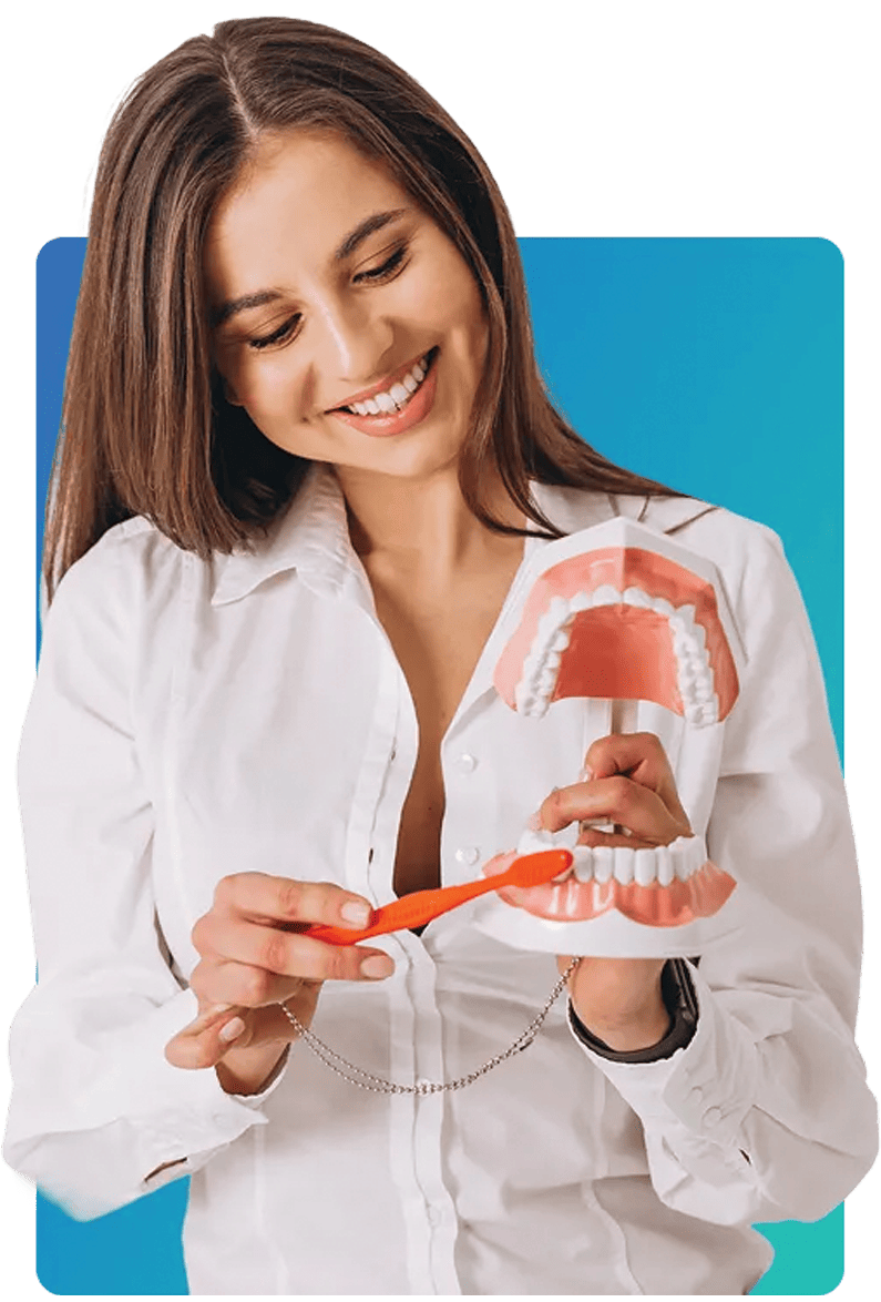 Locations 1 a women holding dentures model in hand